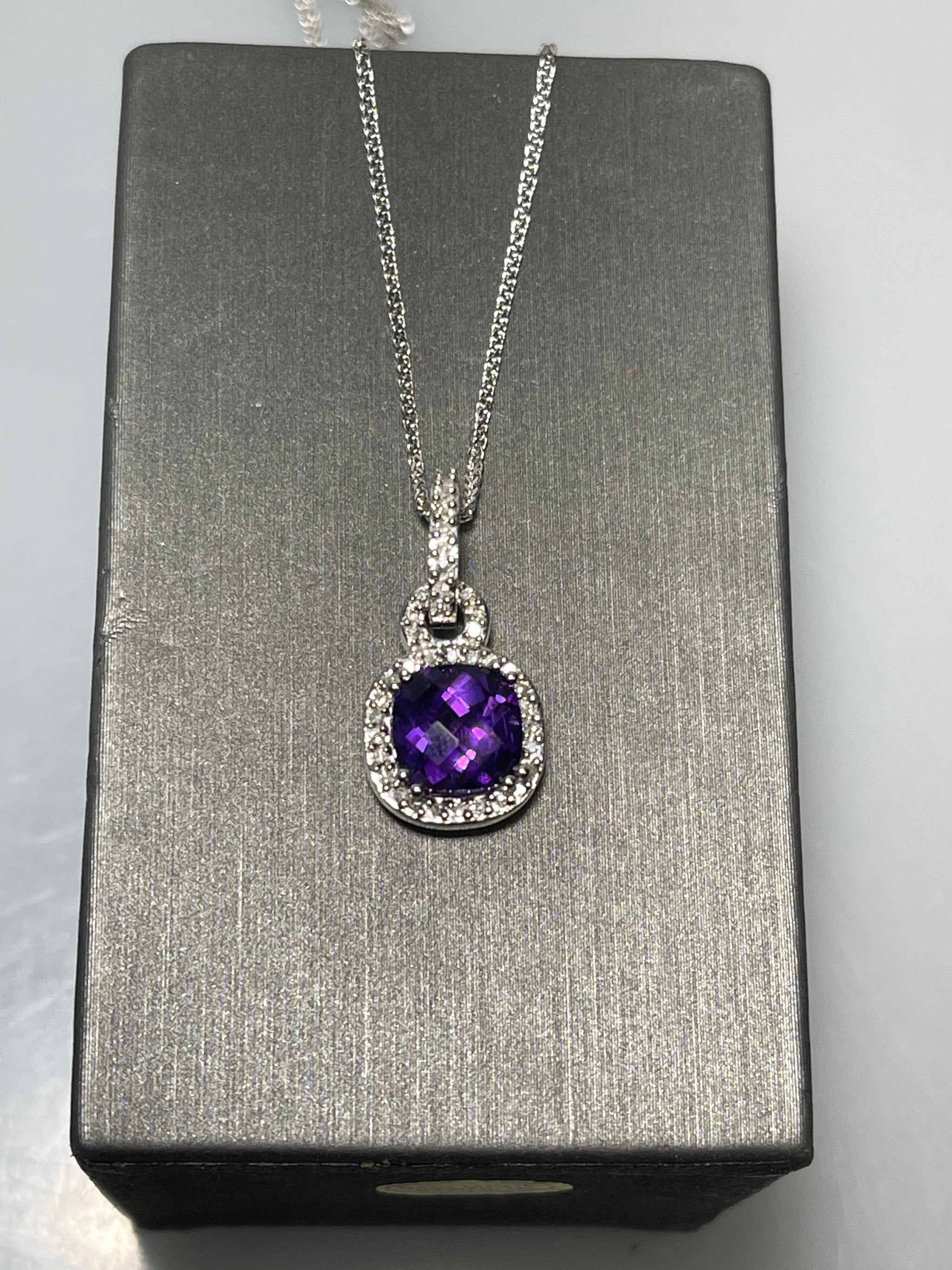 Vintage 5 carat hot amethyst with a 15 point diamond pendant and chain